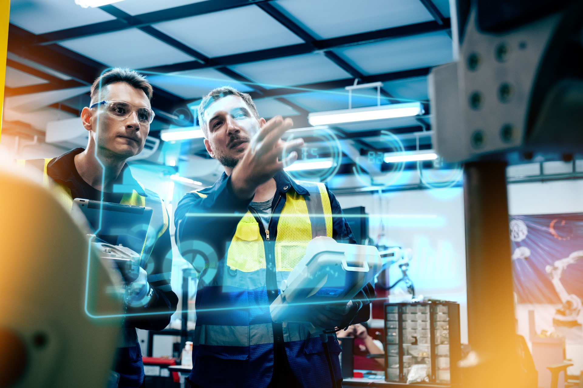 Multiracial tachnicial engineer training with robot arm